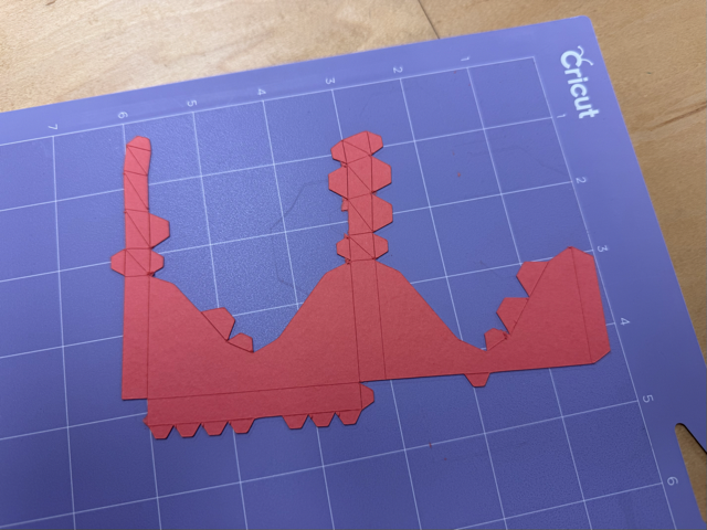 Photo of a papercraft cutout.